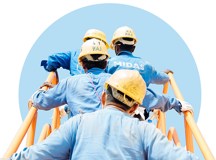 Photo of men yellow helmets climbing a construction site ladder