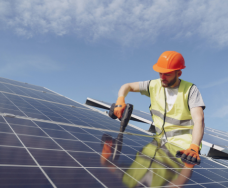 Man installing solar panels